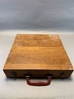 Closed wooden case exterior showing condition