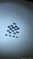 Group of square blue sapphires on white background