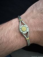 Bracelet worn on wrist showing full design