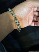 Bracelet on wrist showing overall design and fit