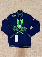 Front view of navy Psycho Bunny jacket with tags