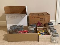 Two cartons of Crown mason jars in dividers plus tray of additional jars and accessories