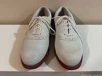 Front view showing uppers, laces, material, and condition