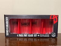 Front view of boxed 4-pack Sons of Anarchy pint glass set
