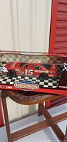 Front view of boxed 1:18 Geoff Bodine #15 Motorcraft Ford Thunderbird die-cast