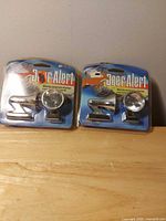 Front view showing both sealed Deer Alert packages