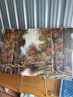 Front view of full painting on canvas showing entire autumn landscape scene
