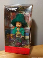 Front view of boxed Mayor Munchkin Tommy doll