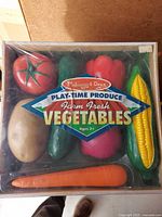 Front of sealed Melissa & Doug Play-Time Produce Vegetables box