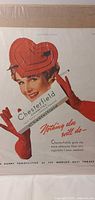 Front view of full advertisement page featuring woman with heart hat and Chesterfield pack