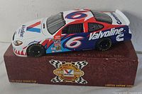 Model car on its box showing livery and limited edition text