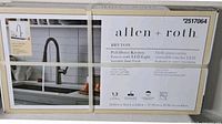 Front of sealed box showing faucet image and branding