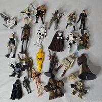 All 25 pieces laid out on white cloth