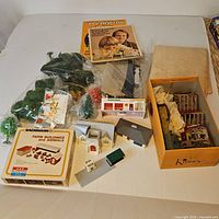 Entire lot with boxed Bachmann kit, booklet, trees, road pieces and Kinney box