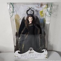 Front view of unopened Maleficent Royal Coronation doll in box