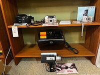 Shelf view showing all cameras and accessories