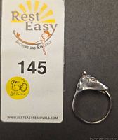 Ring front with horse head visible