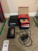 Entire lot showing both recorders, tape pack, cassette case and remote