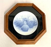 Front view of framed Bing & Grondahl 1909 Christmas plate