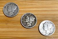 Obverse of three Mercury dimes dated 1929, 1943, 1947