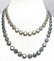 Necklace on bust showing two strands of grey and white coin pearls