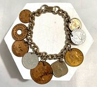 Bracelet front showing arrangement of nine coins and clasp