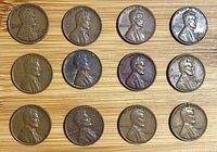 Fronts of 12 Lincoln wheat pennies