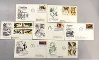 Front view of eight wildlife First Day Covers with stamps and cachets