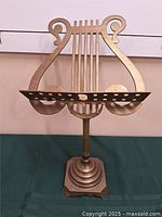 Full view of brass lyre music stand