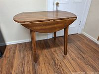 Table with both leaves lowered showing rectangular center section