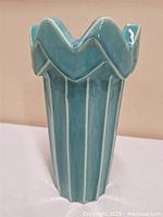 Full view of teal fluted vase