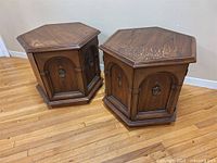 Both hexagonal wooden side tables front view
