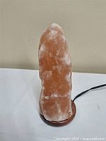 Full view of salt lamp showing shape and color