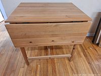 Full view of table with one leaf down