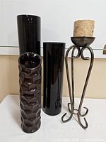 Front view showing all three vases, candle stand and candle