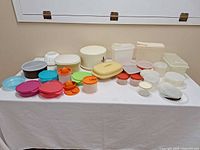 overview of all plastic containers on table