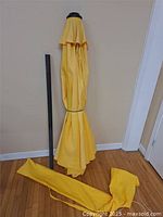 Umbrella folded with stand pole and bag