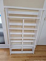 Full front view of white wooden rack