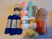 Group shot of all yarn skeins showing colours and labels