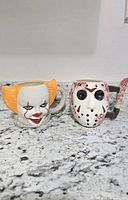 Front view of both mugs on countertop