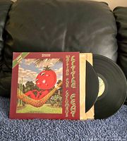 Front cover with one record partially removed