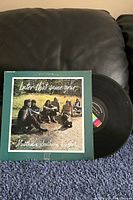 Front cover and vinyl showing label