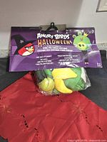 Front of packaged Angry Birds King Pig costume showing branding and contents list