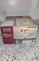 Retail box showing brand, product image and model number