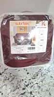 Front of packaged Subrtex slipcover showing brand and product photo