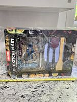 Front view of sealed 20-piece kitchen set box with utensils visible