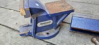 Swivel base and fixed jaw showing Mastercraft badge and rust on jaws