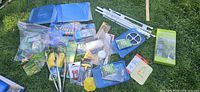 Wide view of all items on grass
