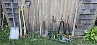 Line-up of all tools against fence