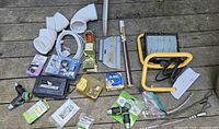 Overall lot showing PVC fittings, work light, battery case, hose splitter, cable and assorted hardware